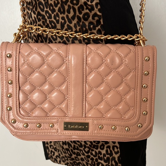 bebe Handbags - Bebe pink quilted gold chain crossbody bag with studs